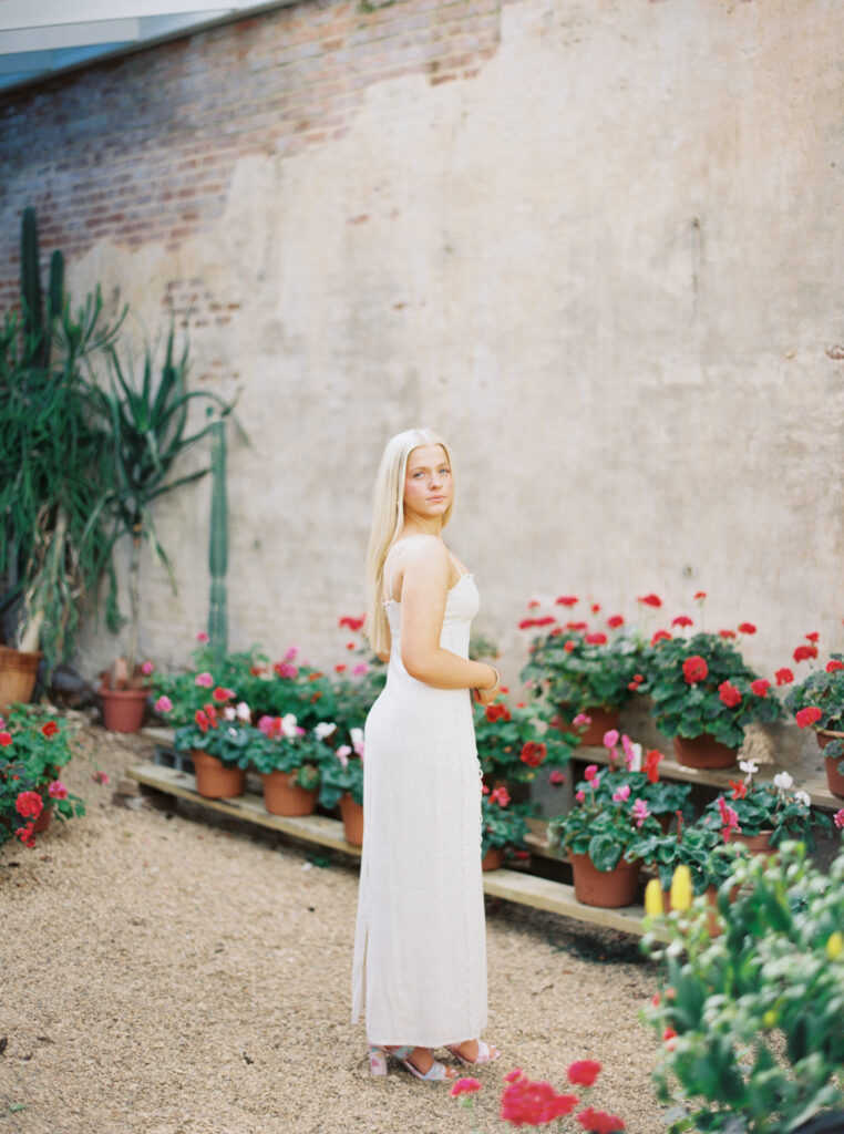 Senior portrait in the oak-lined alley at Rosedown Plantation in Saint Francisville, LA, photographed by Morgan Alysse Photography.