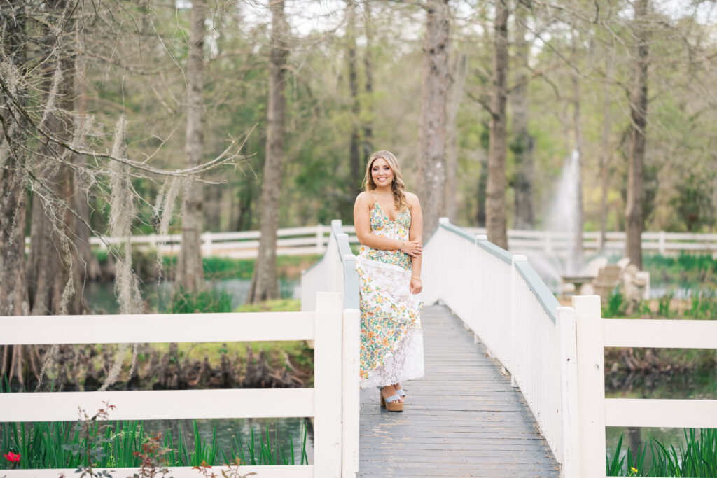 Senior portrait on the bridge| Photos of The Myrtles Plantation in Saint Francisville, LA, photographed by Morgan Alysse Photography.