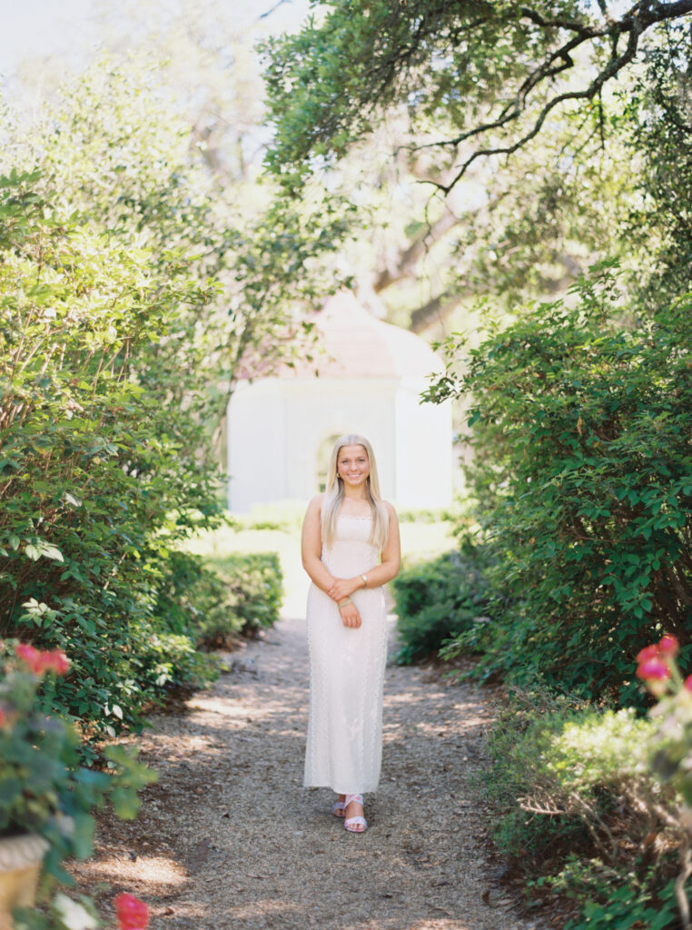 Amy standing in the gardens at Rosedown Plantation during her senior session at Rosedown Plantation, photographed by Morgan Alysse Photography