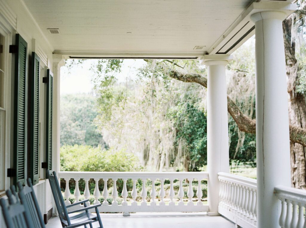 Portrait of the front porch of the historic home at Rosedown Plantation in Saint Francisville, LA, photographed by Morgan Alysse Photography.