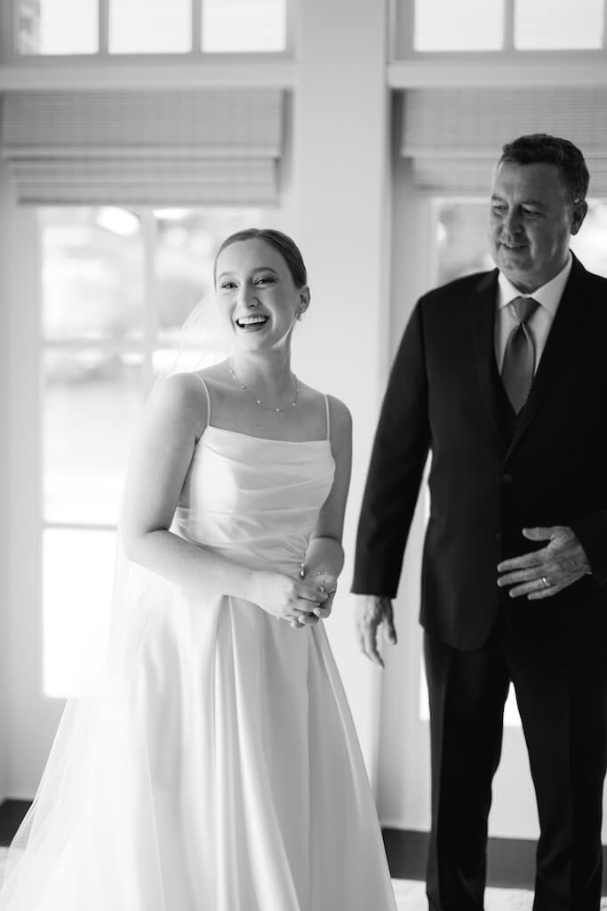 Father and daughter first look at Olivia and Landon's Oak Crossing Wedding in Lake Charles, LA, photographed by Morgan Alysse Photography.