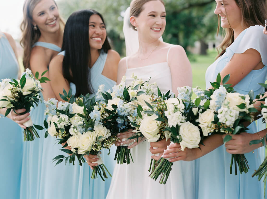 Bride with bridesmaids portrait at Olivia and Landon's Oak Crossing Wedding in Lake Charles, LA, photographed by Morgan Alysse Photography.