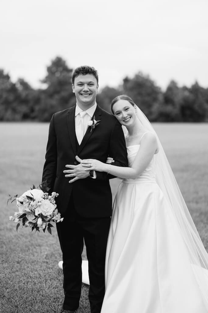 Bride and groom portrait at Olivia and Landons Oak Crossing Wedding at  in Lake Charles, LA, photographed by Morgan Alysse Photography.