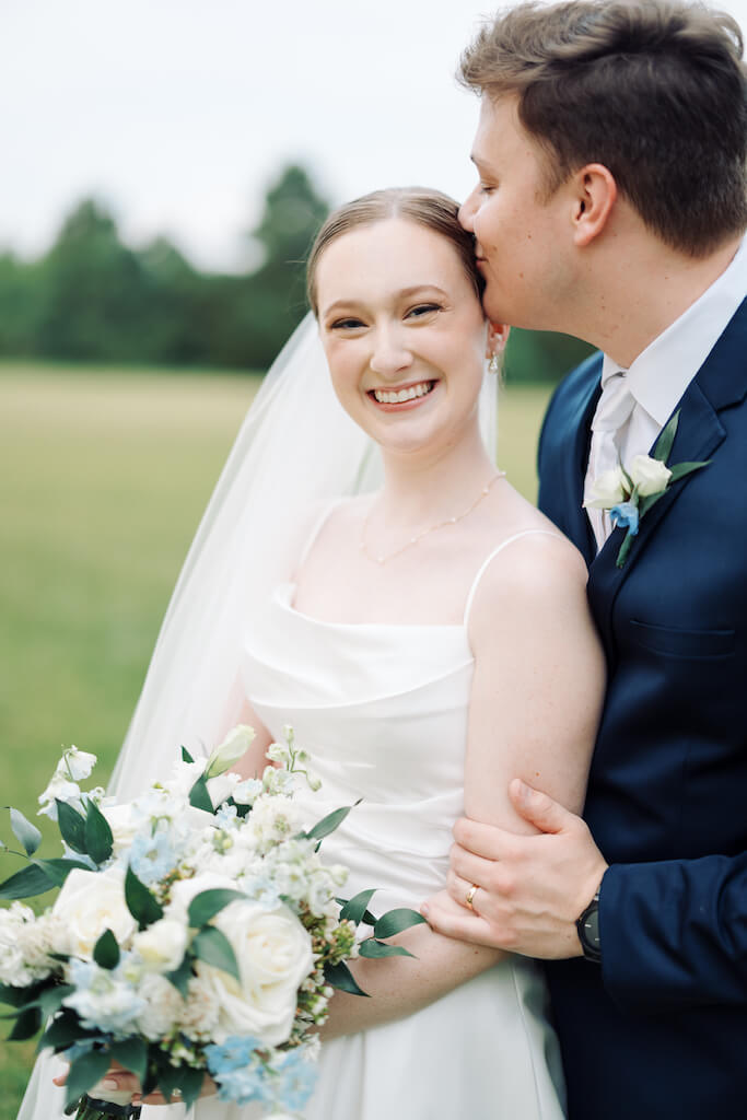 Bride and groom portrait at Olivia and Landons Oak Crossing Wedding at  in Lake Charles, LA, photographed by Morgan Alysse Photography.