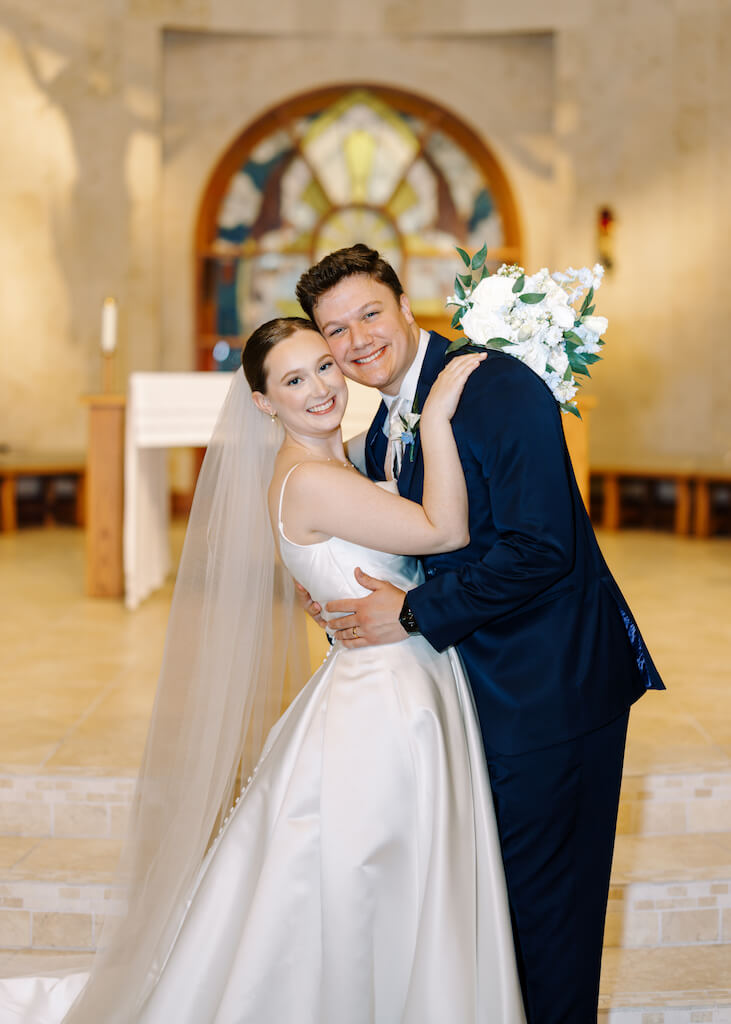 Bride and groom portrait at St. Martin De Porres Catholic Church in Lake Charles, Louisiana, photographed by Morgan Alysse Photography.