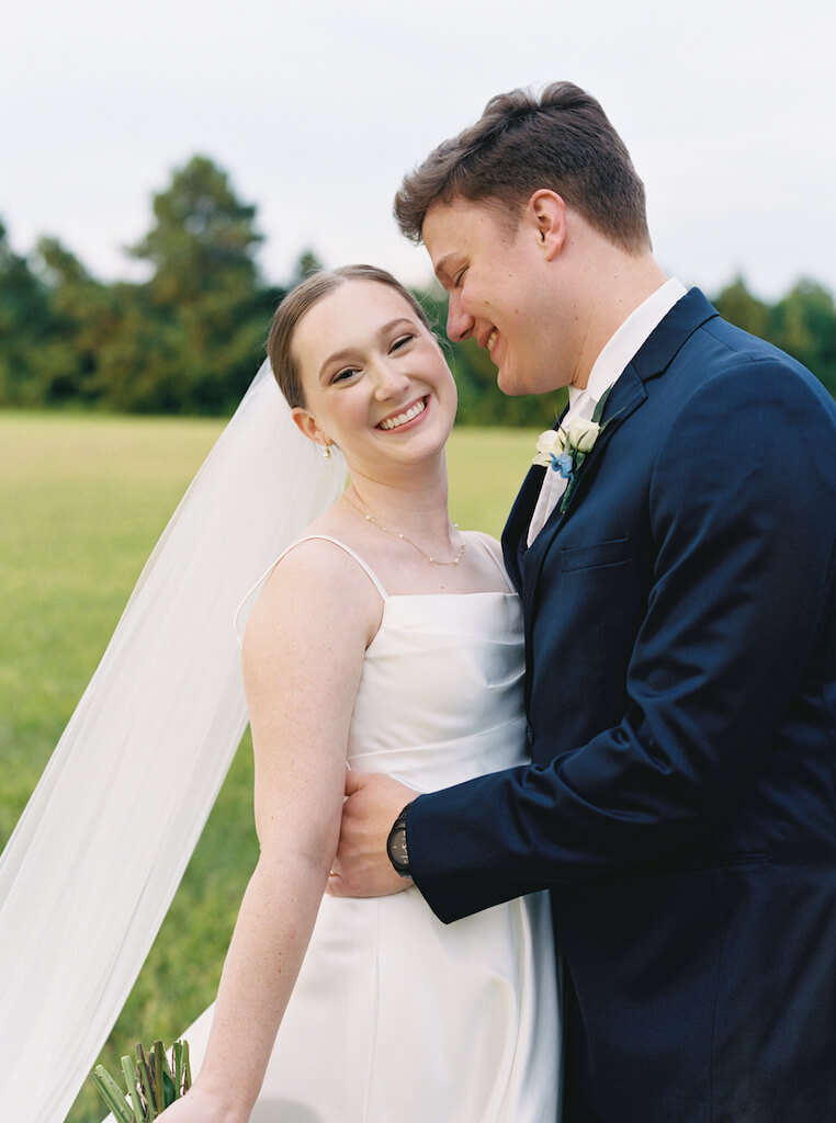 Bride and groom portrait at Olivia and Landons Oak Crossing Wedding at  in Lake Charles, LA, photographed by Morgan Alysse Photography.