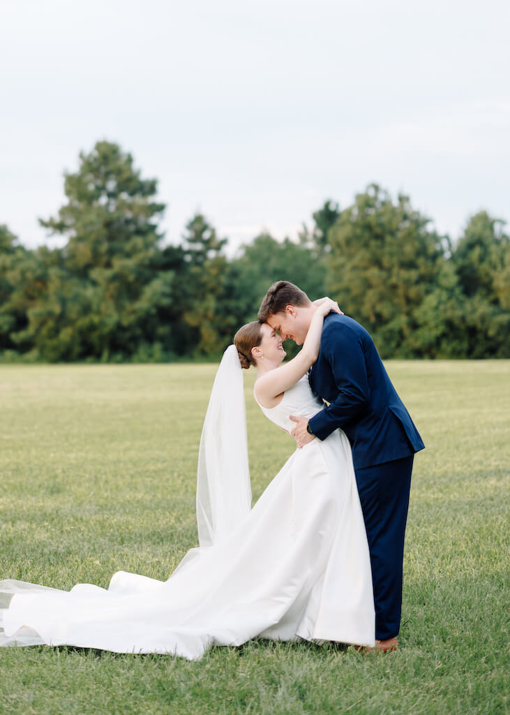 Bride and groom portrait at Olivia and Landons Oak Crossing Wedding at  in Lake Charles, LA, photographed by Morgan Alysse Photography.