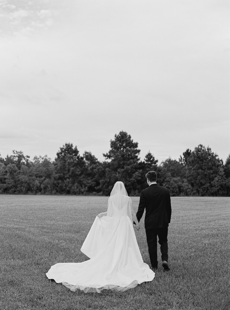 Bride and groom portrait at Olivia and Landons Oak Crossing Wedding at  in Lake Charles, LA, photographed by Morgan Alysse Photography.