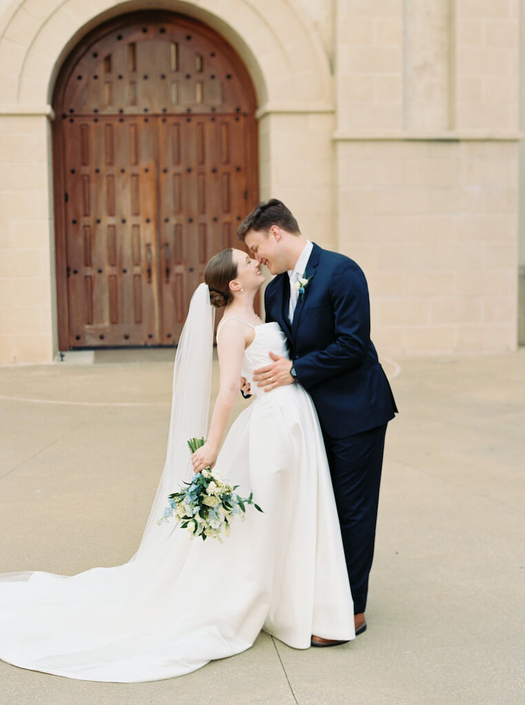 Bride and groom portrait at St. Martin De Porres Catholic Church in Lake Charles, Louisiana, photographed by Morgan Alysse Photography.