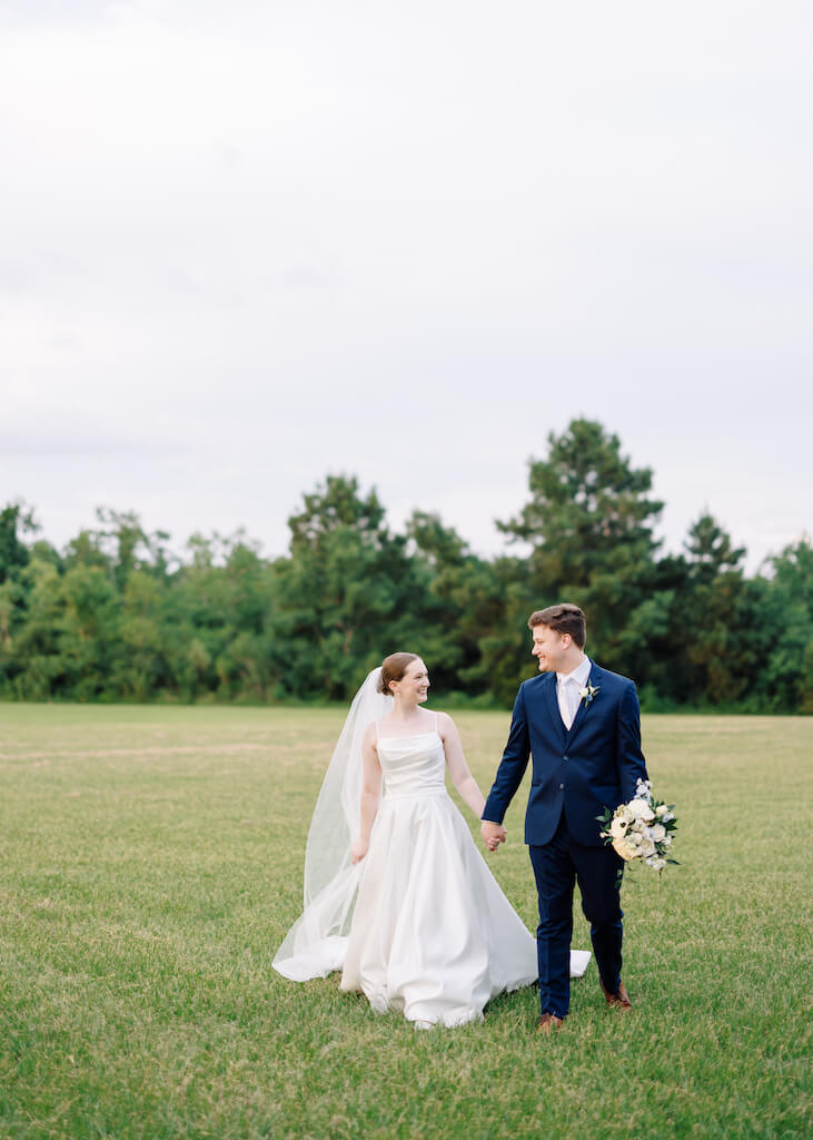 Bride and groom portrait at Olivia and Landons Oak Crossing Wedding at  in Lake Charles, LA, photographed by Morgan Alysse Photography.