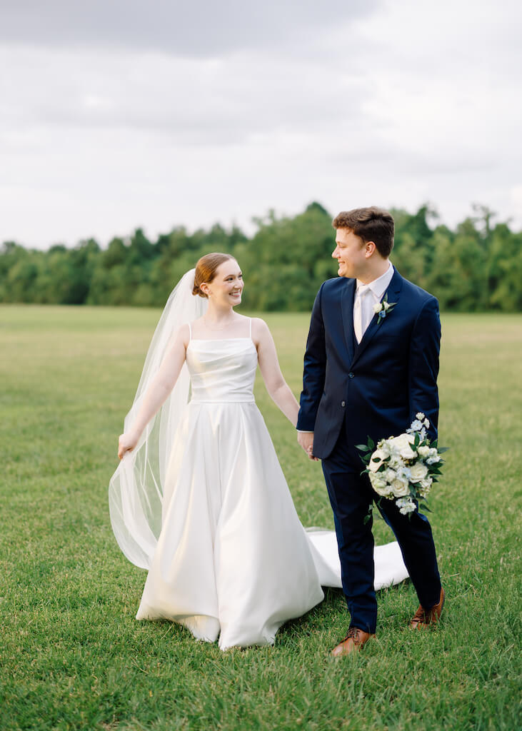 Bride and groom portrait at Olivia and Landons Oak Crossing Wedding at  in Lake Charles, LA, photographed by Morgan Alysse Photography.