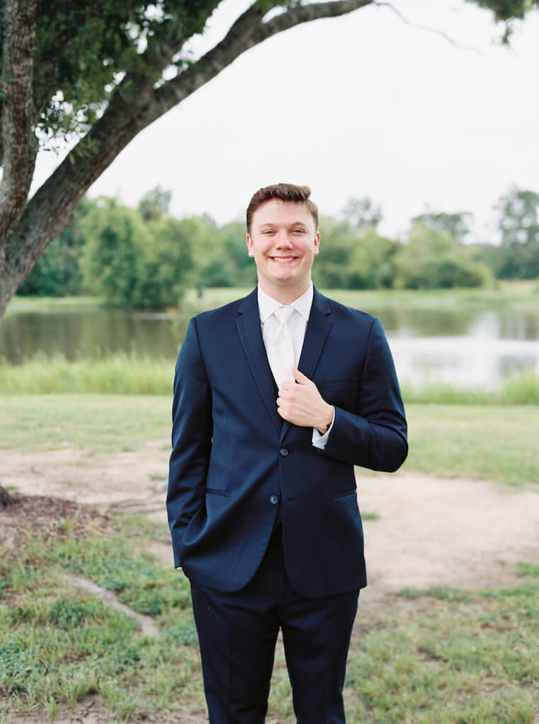 Groom  portrait at Olivia and Landon's Oak Crossing Wedding in Lake Charles, LA, photographed by Morgan Alysse Photography.