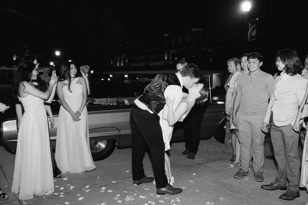 Bride surprising groom with vintage thunderbird exit car at their Oak Crossing Wedding in Lake Charles, LA, photographed by Morgan Alysse Photography.