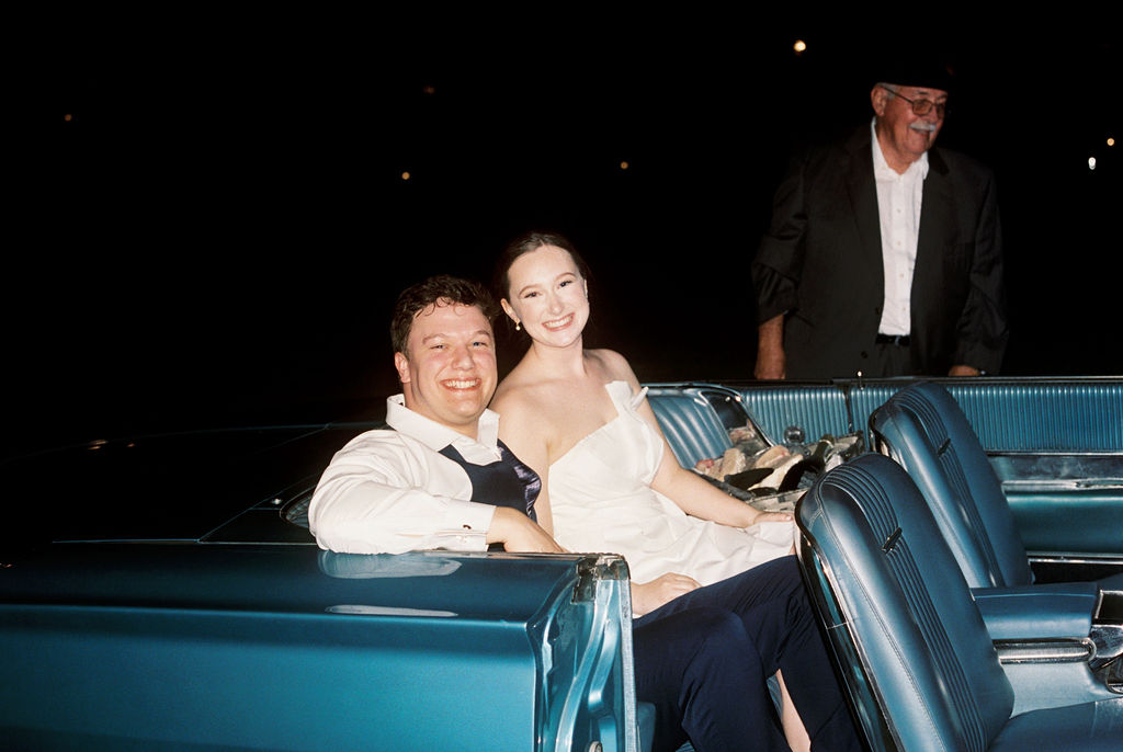 Bride surprising groom with vintage thunderbird exit car at their Oak Crossing Wedding in Lake Charles, LA, photographed by Morgan Alysse Photography.