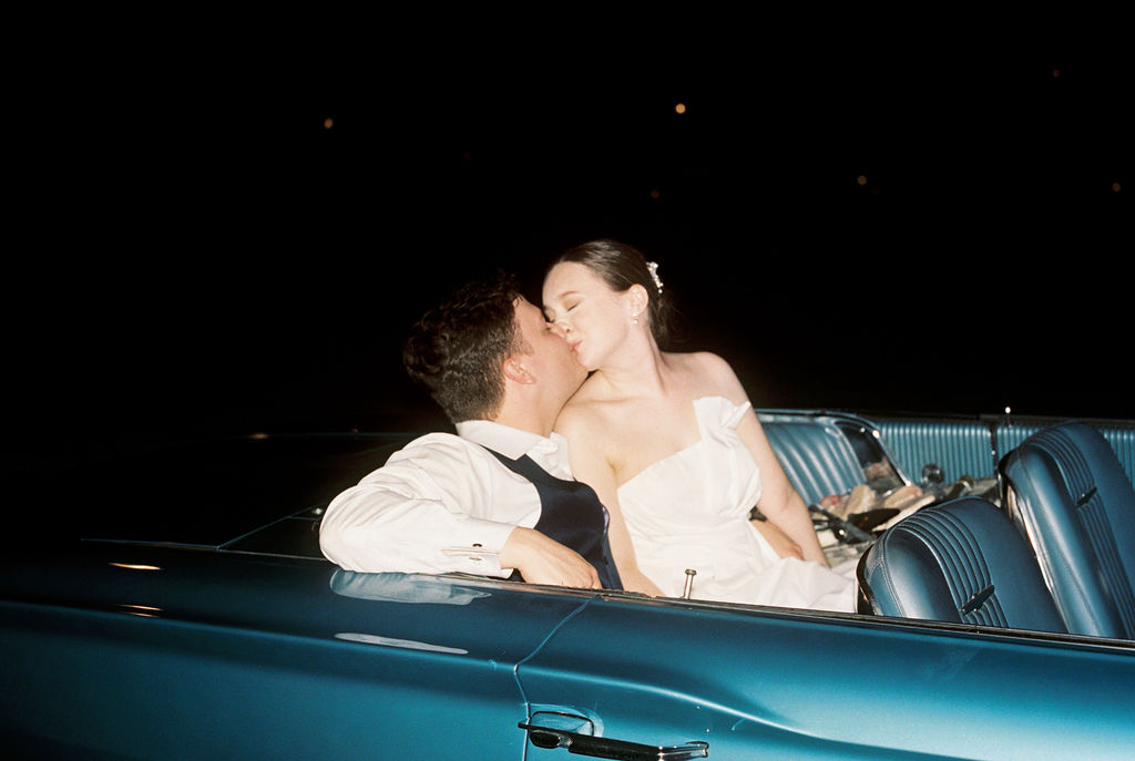 Bride surprising groom with vintage thunderbird exit car at their Oak Crossing Wedding in Lake Charles, LA, photographed by Morgan Alysse Photography.