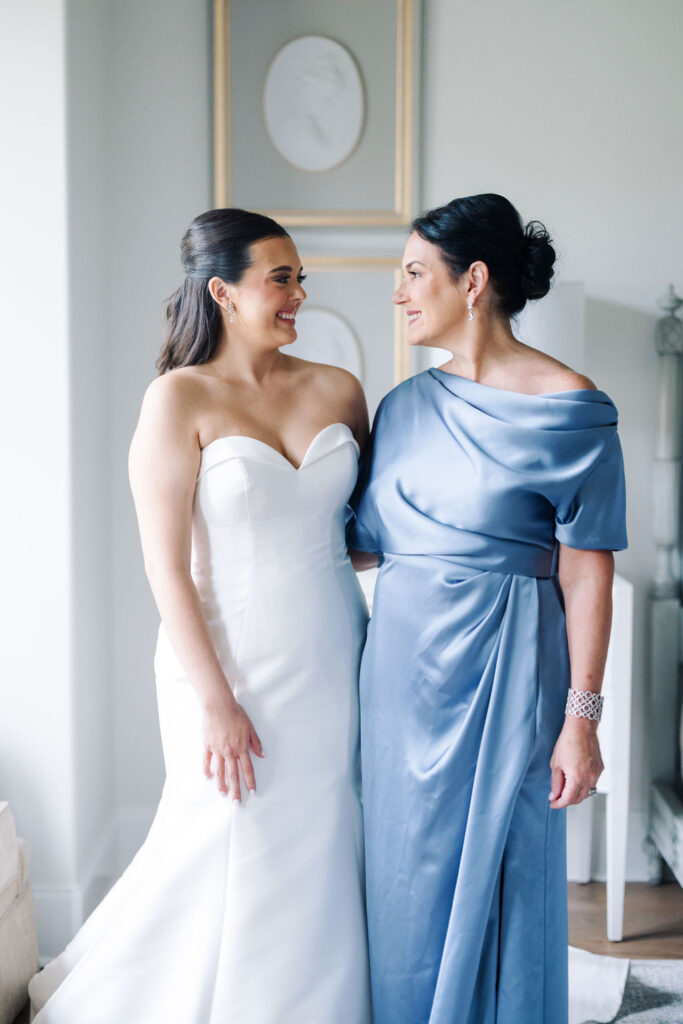 Bride and mother of the bride at Lauren and Colby's rainy day wedding at The Madison in Broussard, LA, photographed by Morgan Alysse Photography.