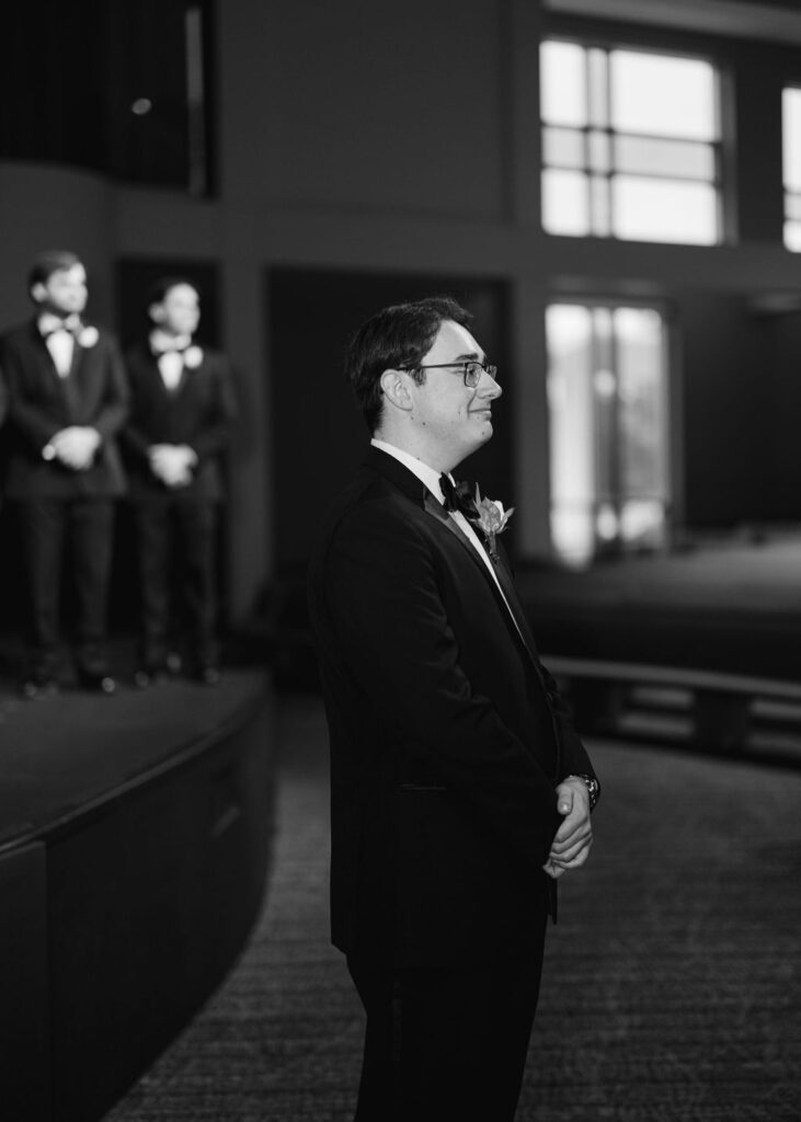 Groom at Lauren and Colby's rainy day wedding ceremony at Our Savior's Church in Lafayette, LA, photographed by Morgan Alysse Photography.