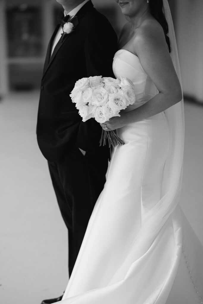 Black and white bride and groom at Lauren and Colby's rainy day wedding at The Madison in Broussard, LA, photographed by Morgan Alysse Photography.