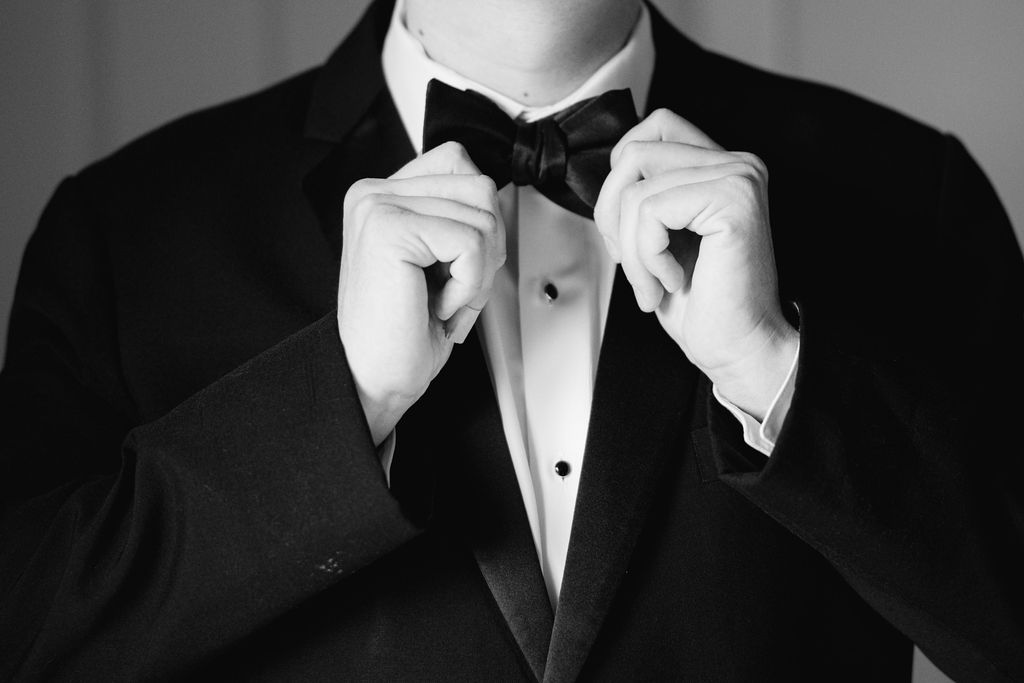 Groom with bowtie at Lauren and Colby's rainy day wedding at The Madison in Broussard, LA, photographed by Morgan Alysse Photography.