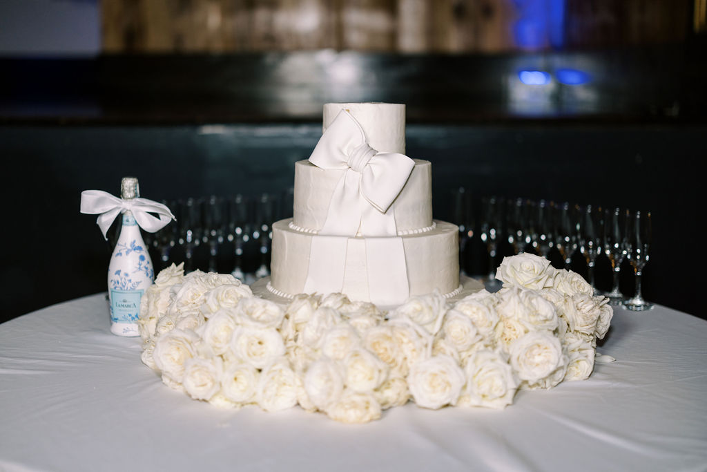 Wedding cake at Lauren and Colby's rainy day wedding at The Madison in Broussard, LA, photographed by Morgan Alysse Photography.