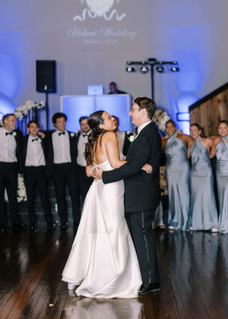 Bride and groom first dance at Lauren and Colby's rainy day wedding at The Madison in Broussard, LA, photographed by Morgan Alysse Photography.