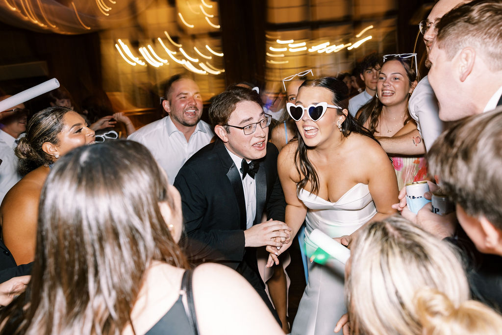 Reception dancing at Lauren and Colby's rainy day wedding at The Madison in Broussard, LA, photographed by Morgan Alysse Photography.