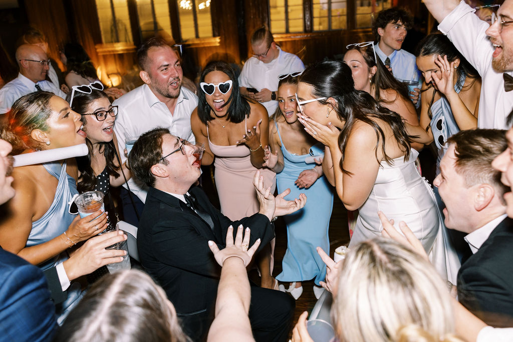 Reception dancing at Lauren and Colby's rainy day wedding at The Madison in Broussard, LA, photographed by Morgan Alysse Photography.