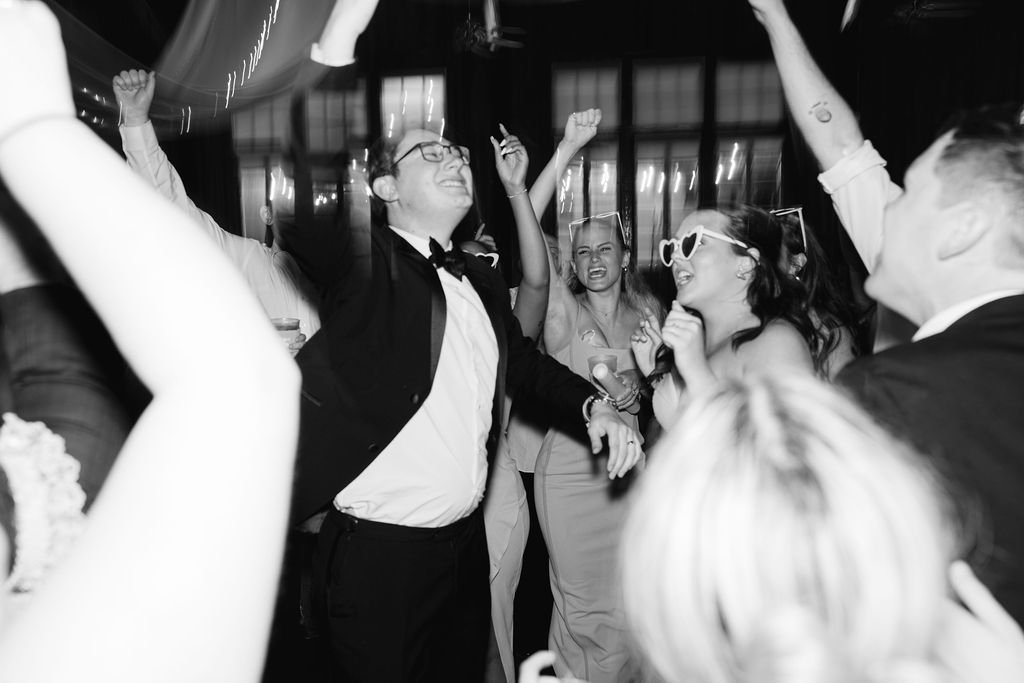 Reception dancing at Lauren and Colby's rainy day wedding at The Madison in Broussard, LA, photographed by Morgan Alysse Photography.