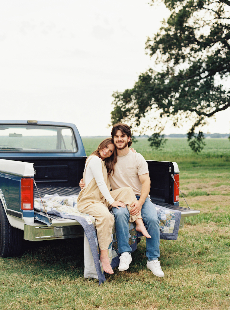 Romantic candid engagement session with a vintage truck near Lafayette, Louisiana, shot by Morgan Alysse Photography.