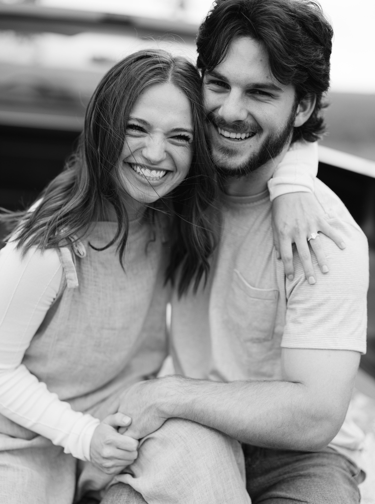 Romantic candid engagement session with a vintage truck near Lafayette, Louisiana, shot by Morgan Alysse Photography.