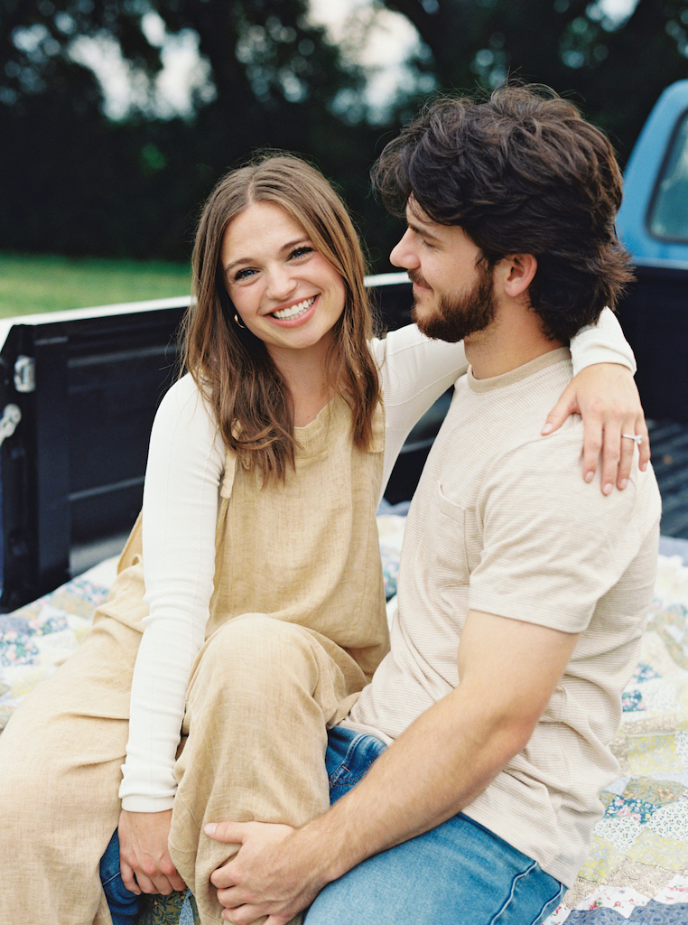 Romantic candid engagement session with a vintage truck near Lafayette, Louisiana, shot by Morgan Alysse Photography.