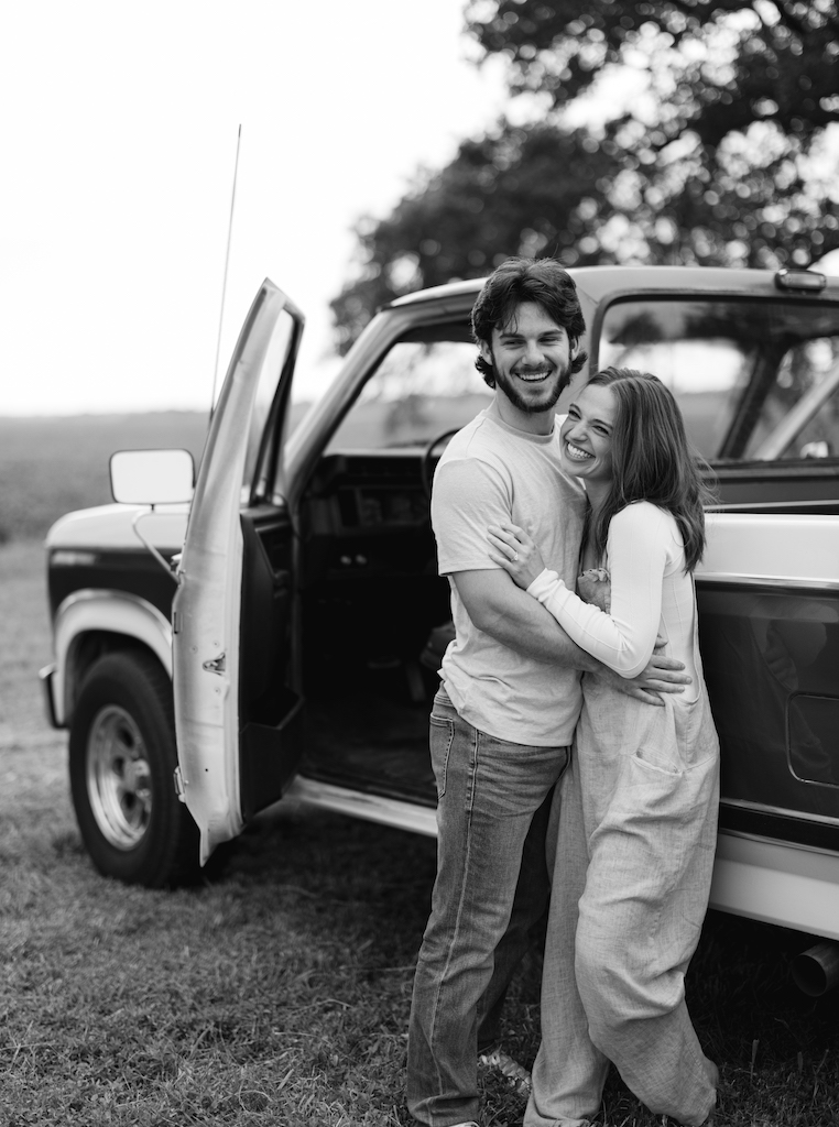 Romantic candid engagement session with a vintage truck near Lafayette, Louisiana, shot by Morgan Alysse Photography.