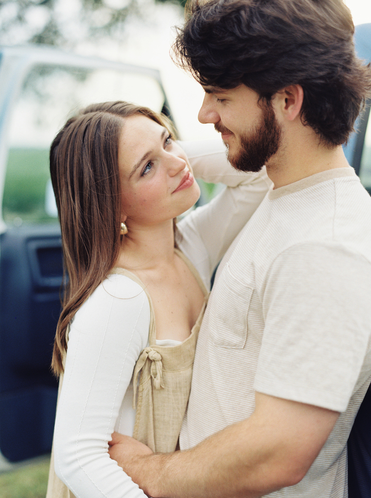 Romantic candid engagement session with a vintage truck near Lafayette, Louisiana, shot by Morgan Alysse Photography.