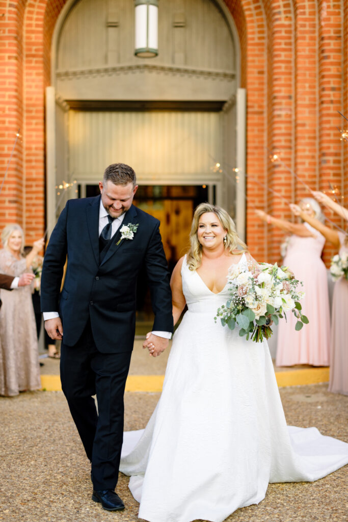 Bride and groom at their wedding at St Landry Catholic Church captured by Morgan Alysse Photography