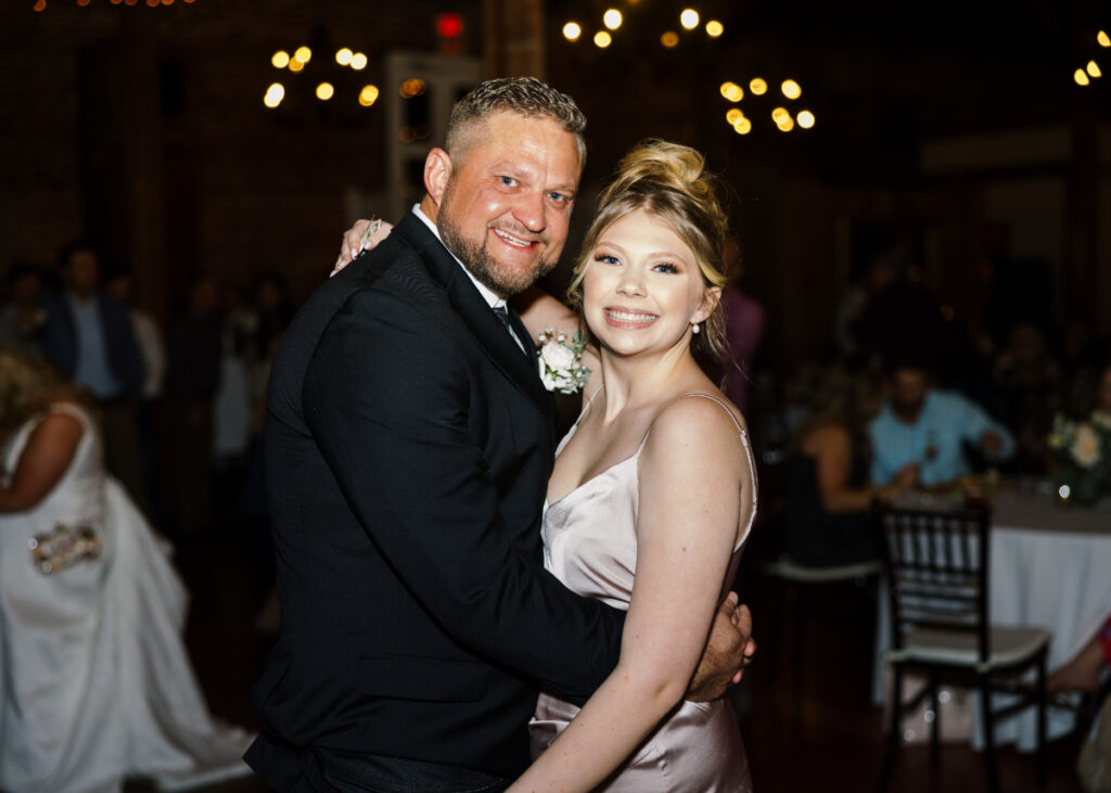 Groom dances with his daughter at his wedding reception at Wolff Banquets & Receptions captured by Morgan Alysse Photography