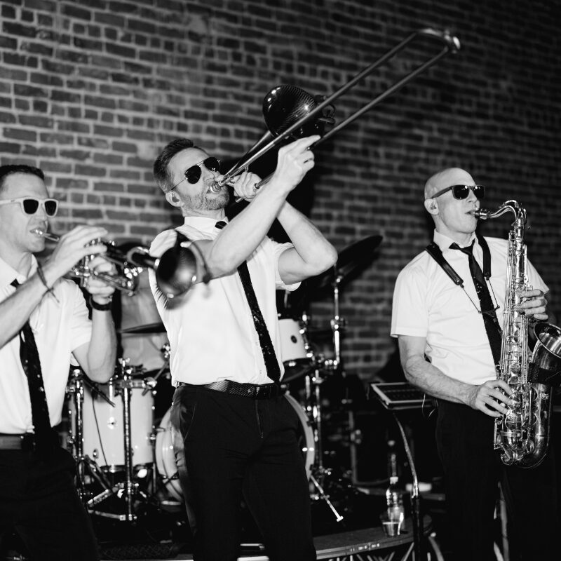 Three Thirty Seven live wedding band at a wedding reception at Wolff Banquets & Receptions captured by Morgan Alysse Photography