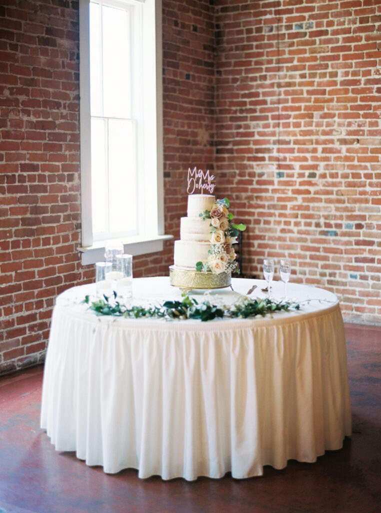 Wedding reception wedding cake table at Wolff Banquets & Receptions captured by Morgan Alysse Photography