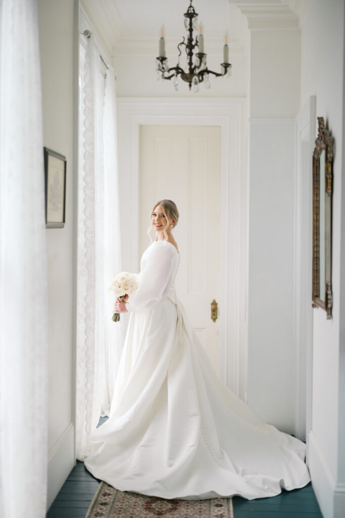 Bridal portrait photo with a white rose bouquet at Arlington Mansion taken by Morgan Alysse Photography