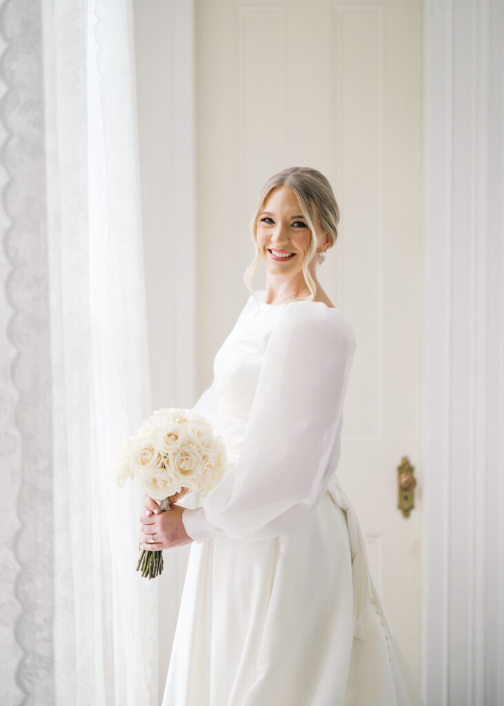 Bridal portrait photo with a white rose bouquet at Arlington Mansion taken by Morgan Alysse Photography