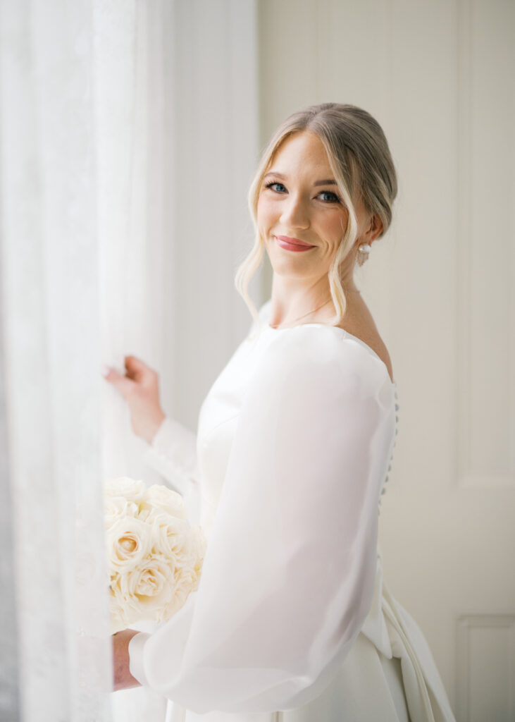 Bridal portrait photo with a white rose bouquet at Arlington Mansion taken by Morgan Alysse Photography