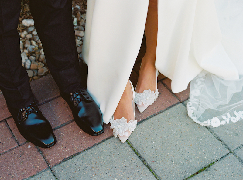 ace-detailed wedding shoes on display at Bayou Rum Distillery