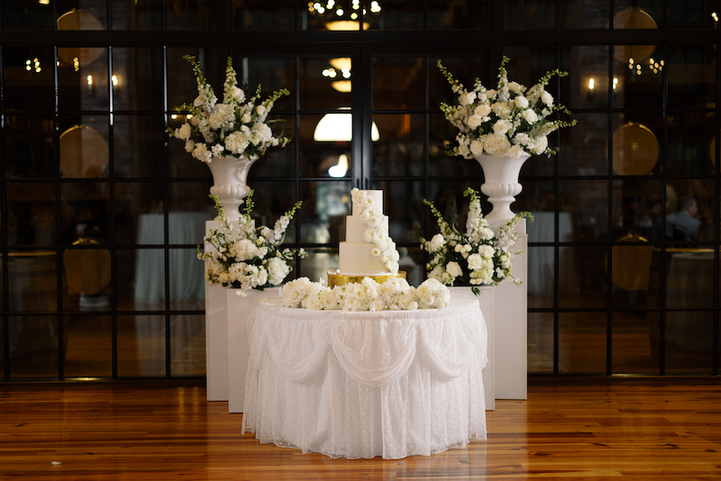 Fresh floral centerpiece by KD Florals at Bayou Rum Distillery wedding