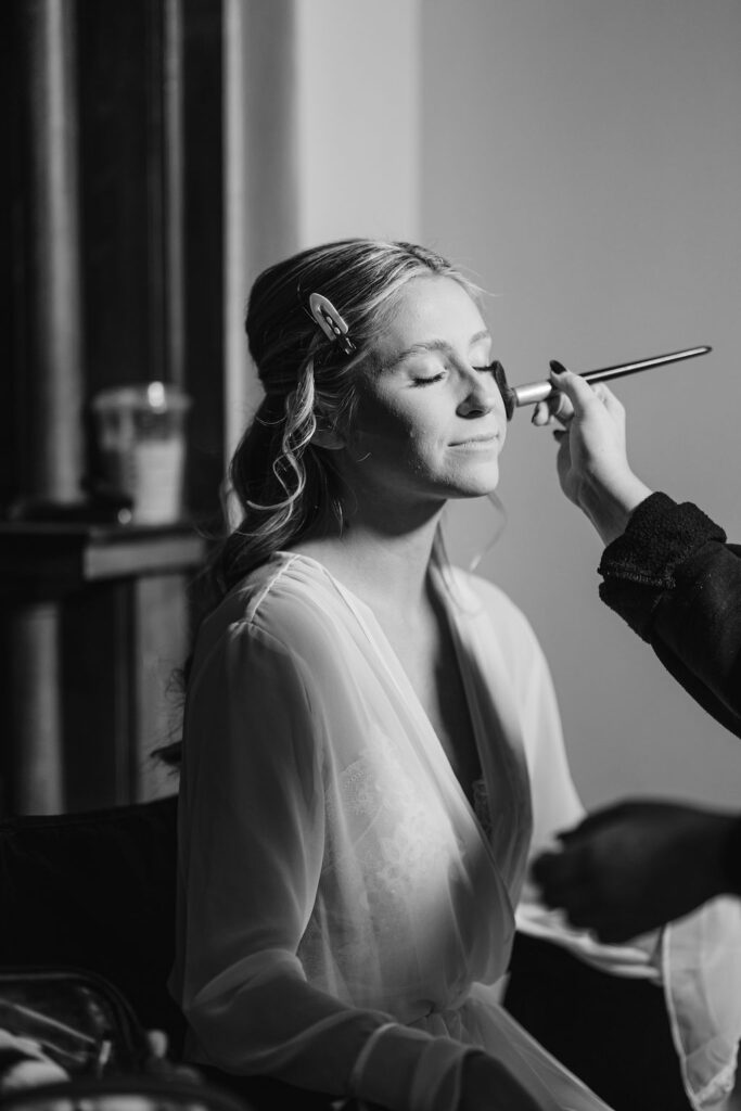 Bride getting ready in the bridal suite at Maison de Tours in Saint Martinville