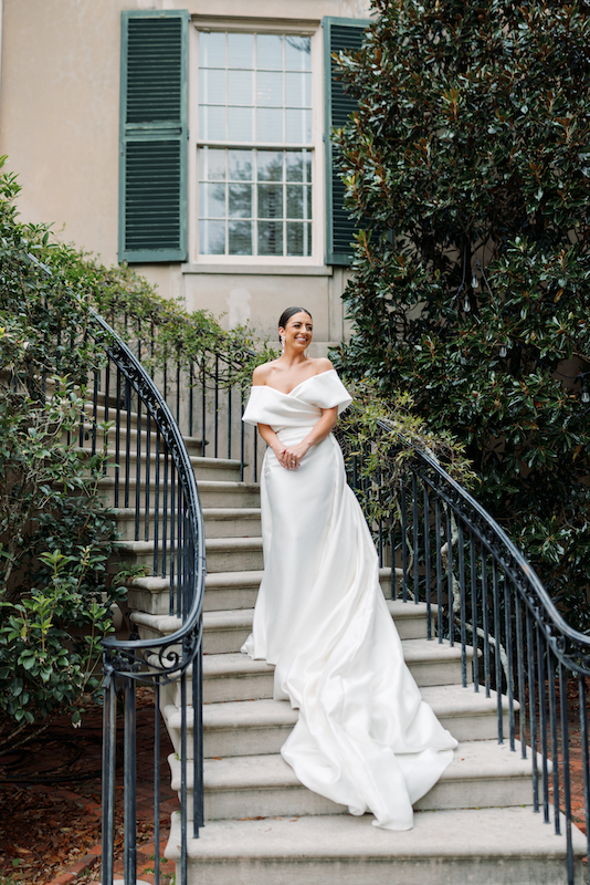 bridal photography with a veil and statement earrings.