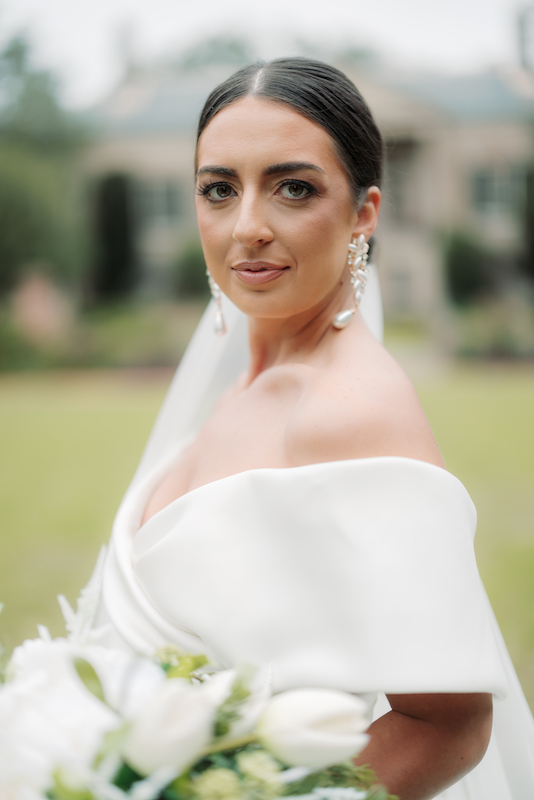 Romantic bride holding her bouquet 