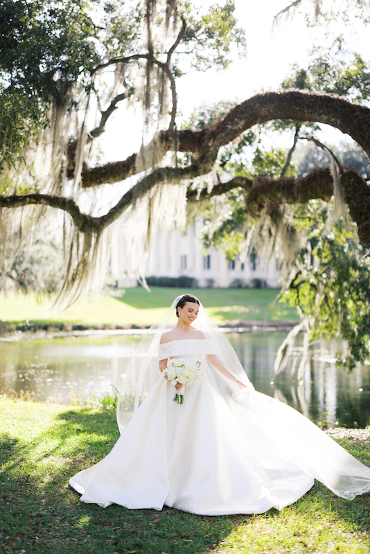 Romantic bridal portraits at Greenwood Plantation with a sunset glow.