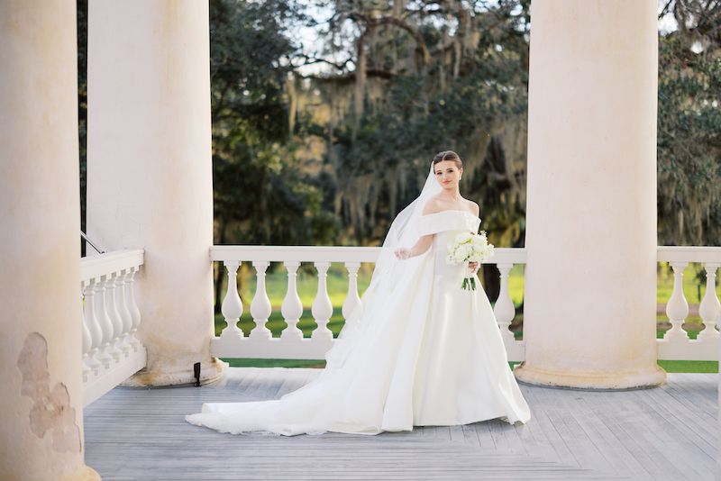 Romantic bridal portraits at Greenwood Plantation with a sunset glow.