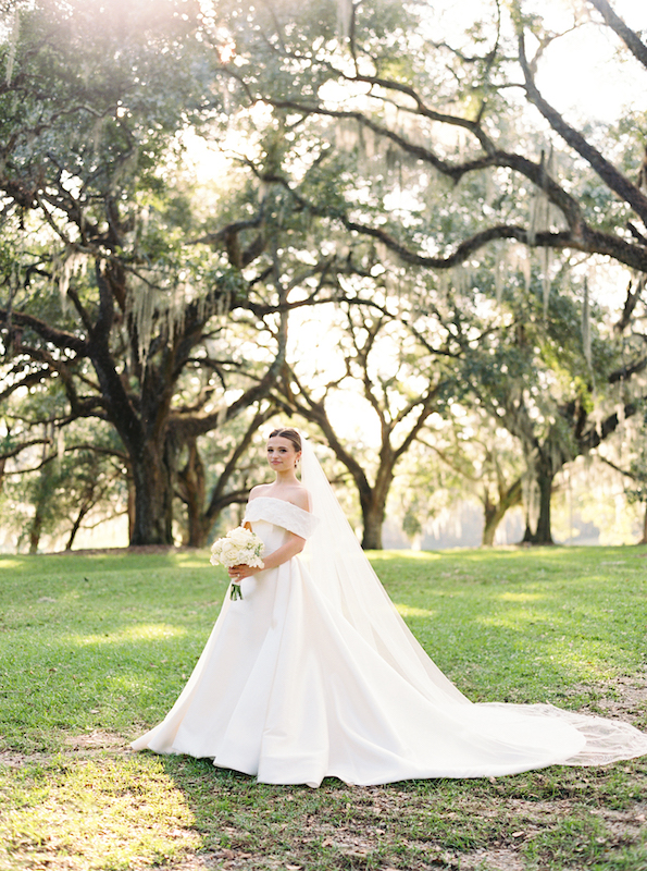 Timeless wedding photography with a bride in an A-line satin gown.