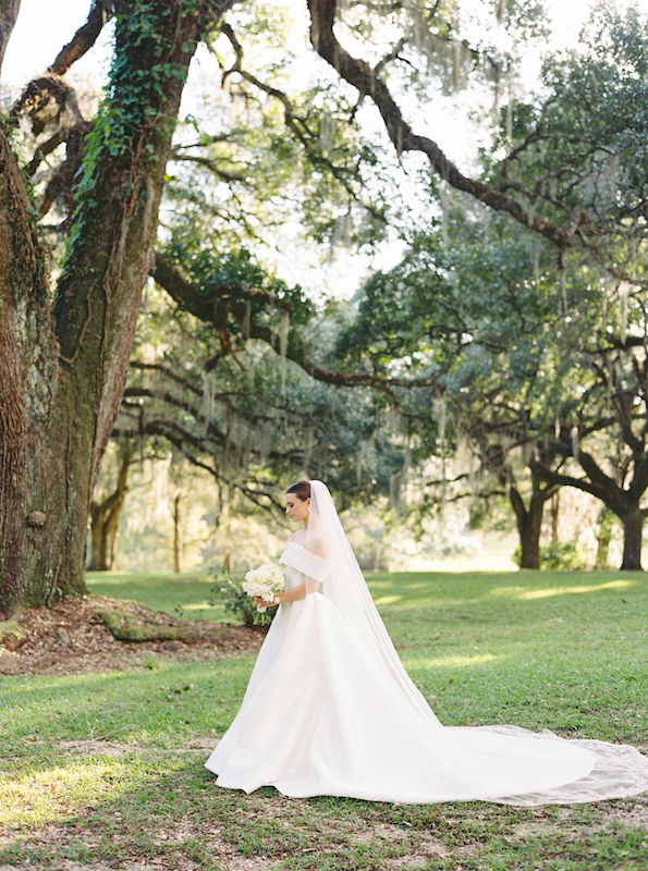 Golden hour bridal session with warm sunlight casting a dreamy glow.